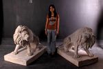 Symmetrical Pair of 39 Inch Entry Lions in Rough Stone